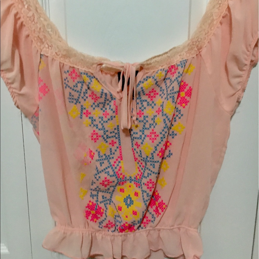 Medium peach-colored flowy blouse
